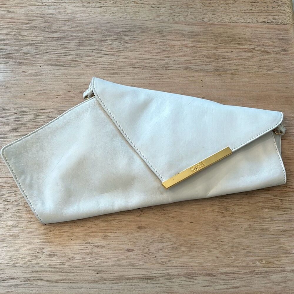 Badgley Mischka white leather interesting shape clutch with removable strap